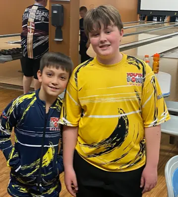 Two youth bowlers.